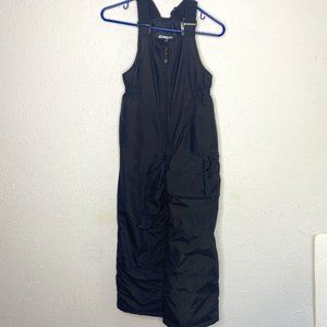 Rawik unisex XL/7 black bib overall snow pants with front zipper closure.